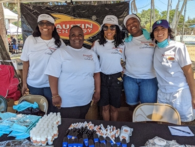 Austin Energy employees reaching out to the community at the Juneteenth Festival, East Austin, 2022