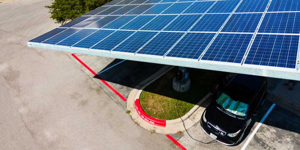 Solar panels above car parking; produces shade and collecting energy