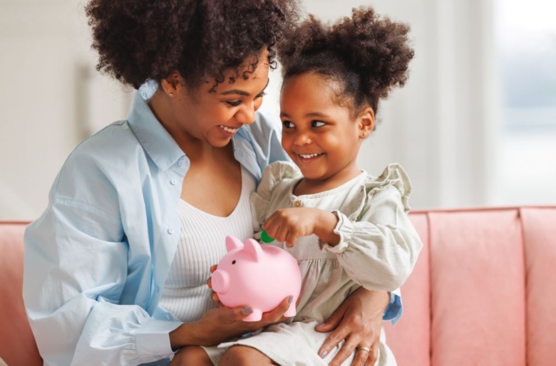 Mom and daughter saving money